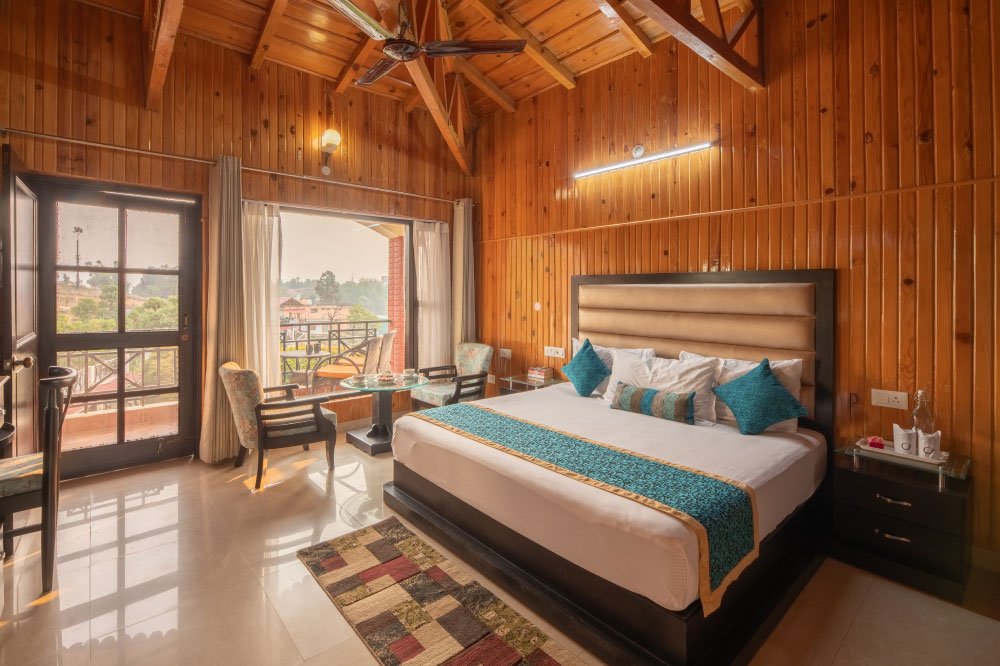 Jungle Retreat room at Ojaswi Himalayan Resort Mukteshwar surrounded by lush forest views