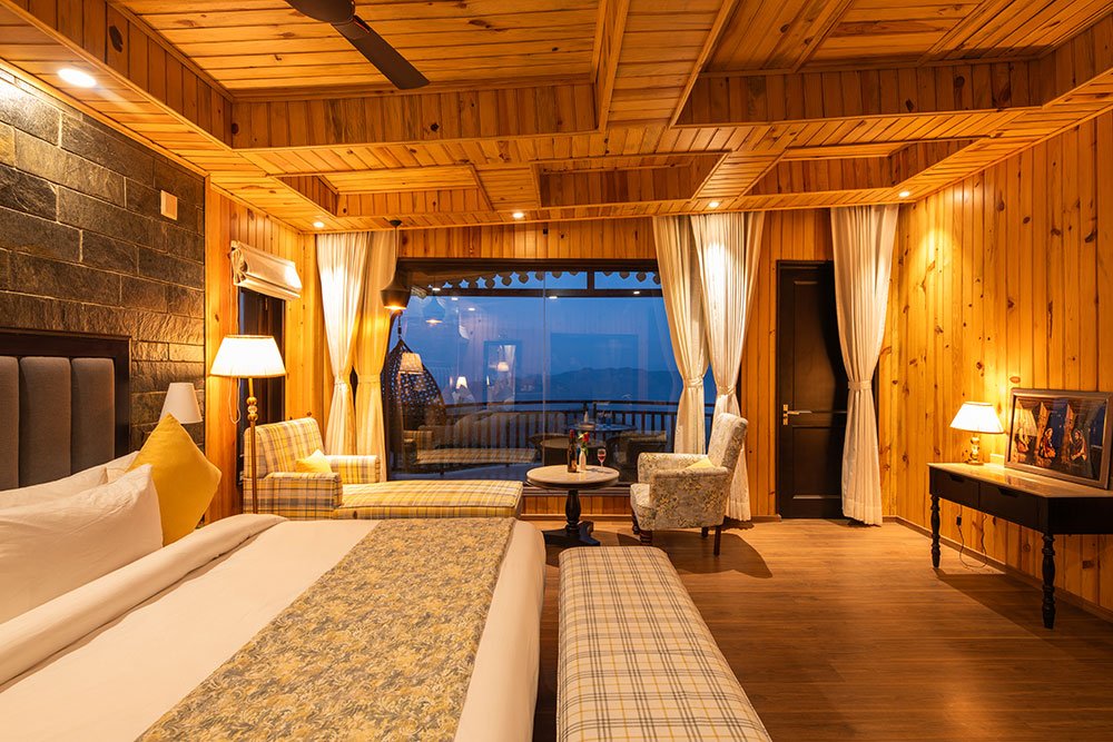 Kafal Retreat room at Ojaswi Himalayan Resort Mukteshwar with cozy mountain-view interiors