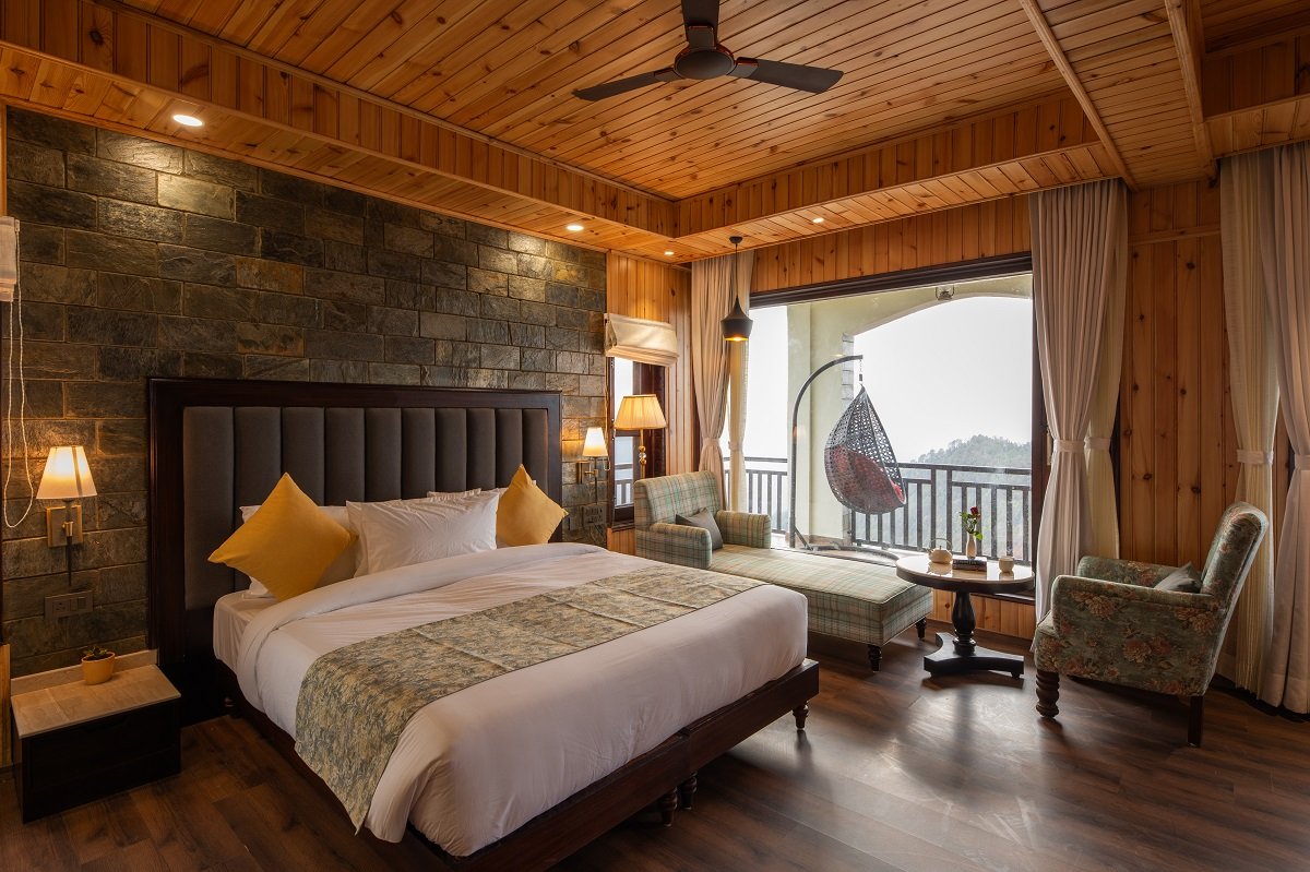 Experience ultimate luxury at Buransh Retreat in Ojaswi Resort, featuring sweeping 180-degree Himalayan views.