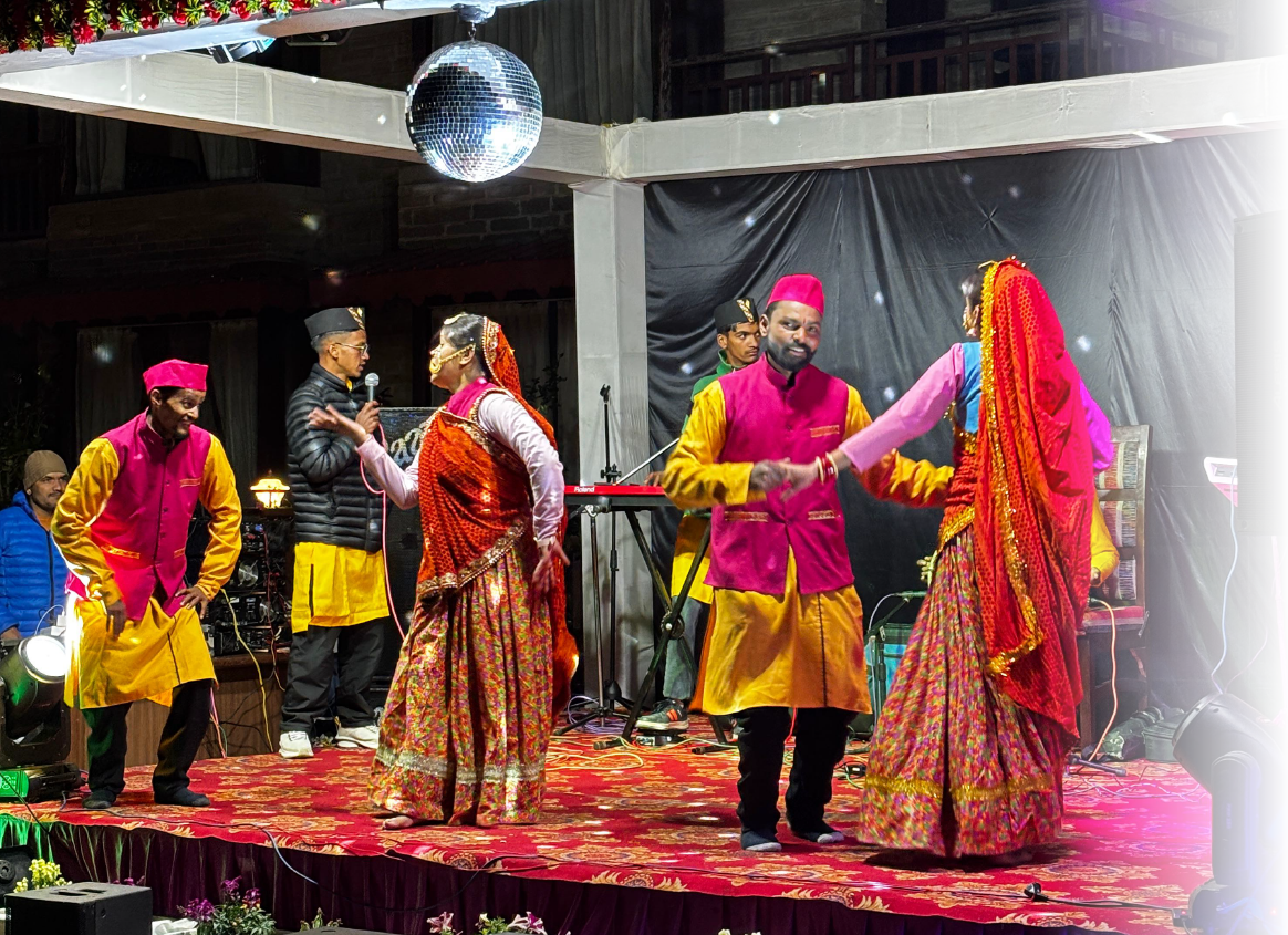 Outdoor Sangeet venue in Mukteshwar at Ojaswi Resort, beautifully lit for unforgettable wedding festivities.
